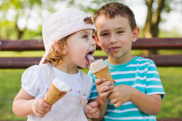 two irish twins sharing ice cream