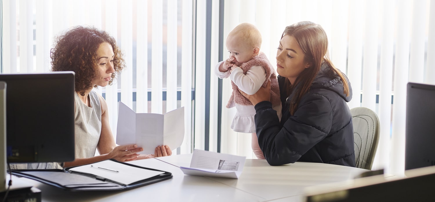 Young mother brings her baby to job interview. Looking for job after divorce.