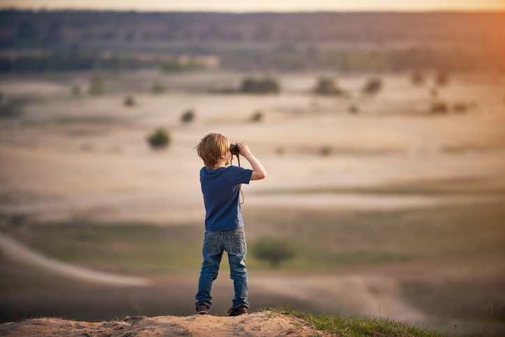 little boy in desert