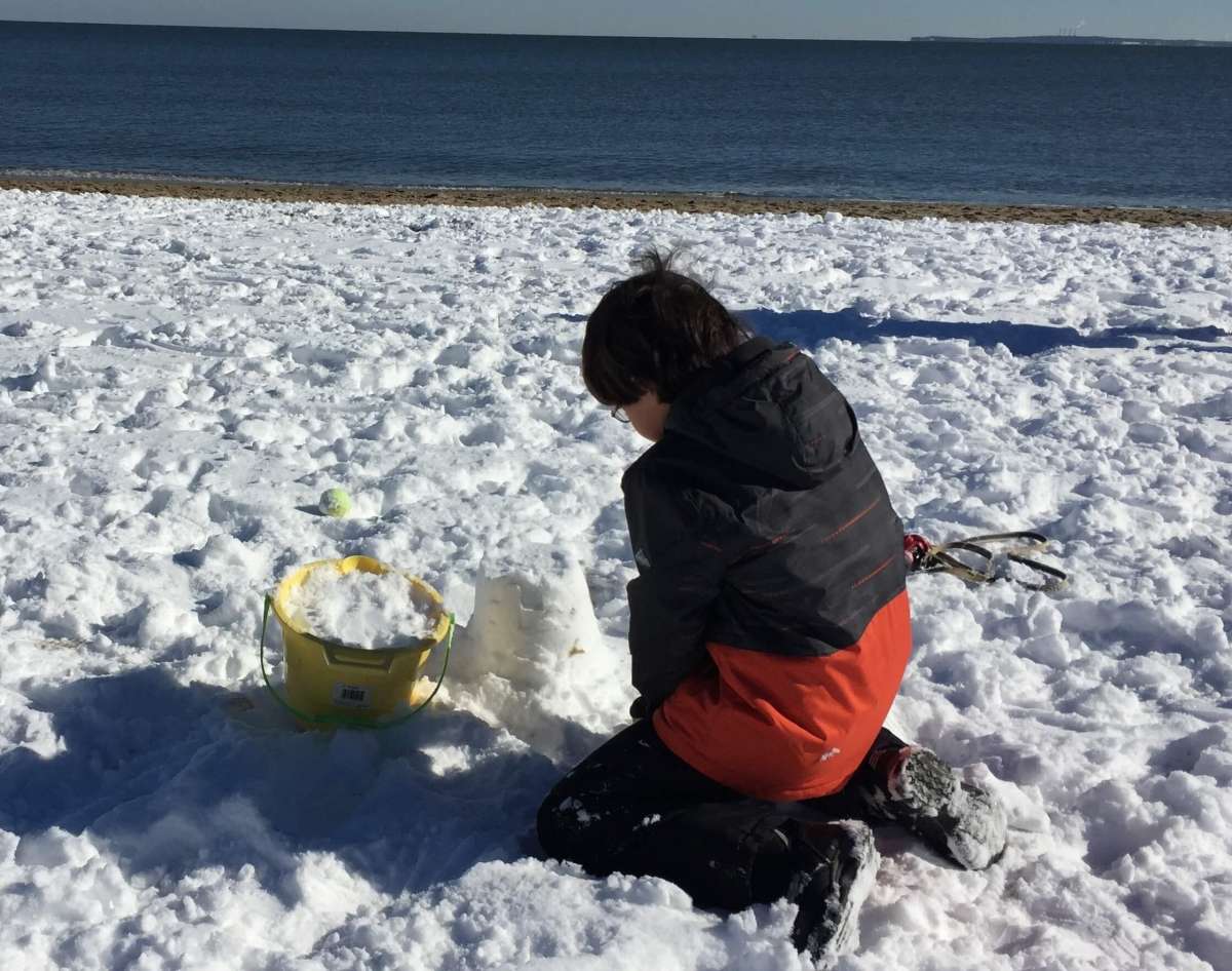 Building Snow Castles at the Beach