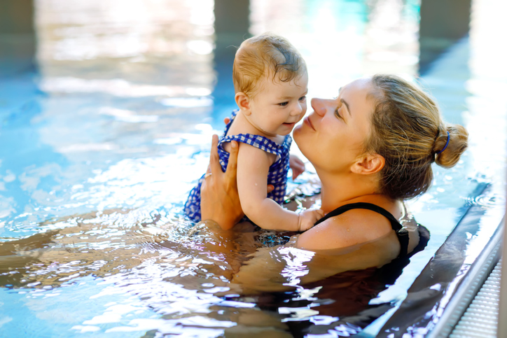 mom and baby swimming