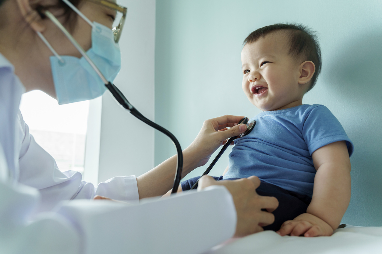 Pediatrician with newborn