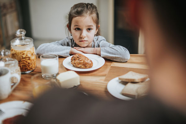 little girl eating gluten free diet