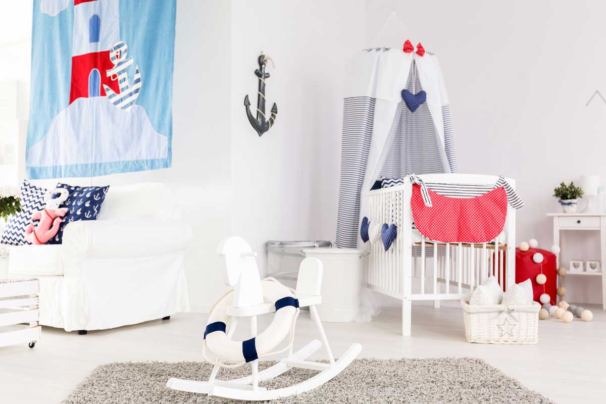 Stylish and happy baby room in marine style