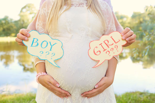 pregnant woman at gender reveal party