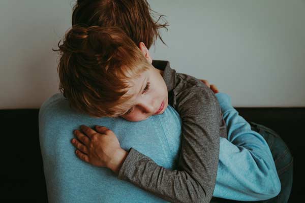 parent comforting highly sensitive child