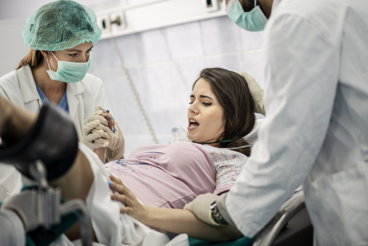 woman giving birth in a hospital