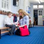child being disciplined at school
