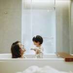 Mom and baby at bath time