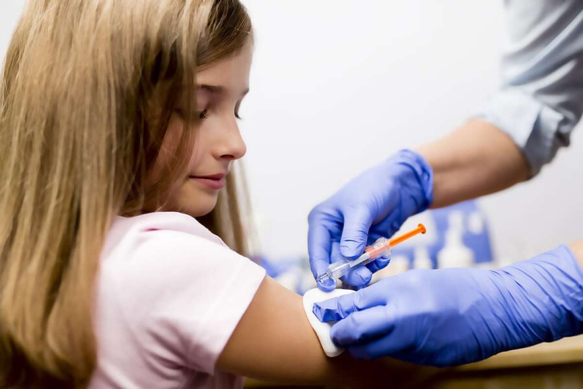 Young Girl Getting Vaccinated