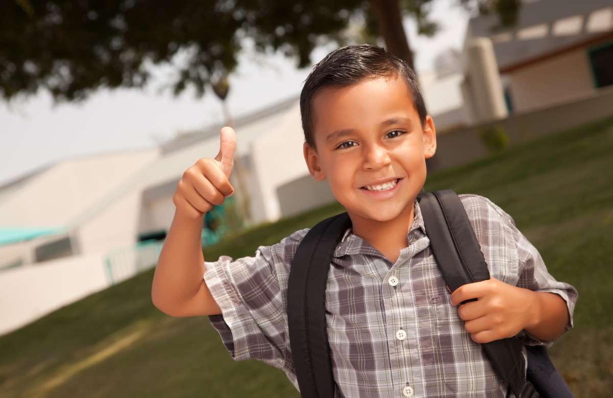 how to transition to back to school schedule - boy going to school