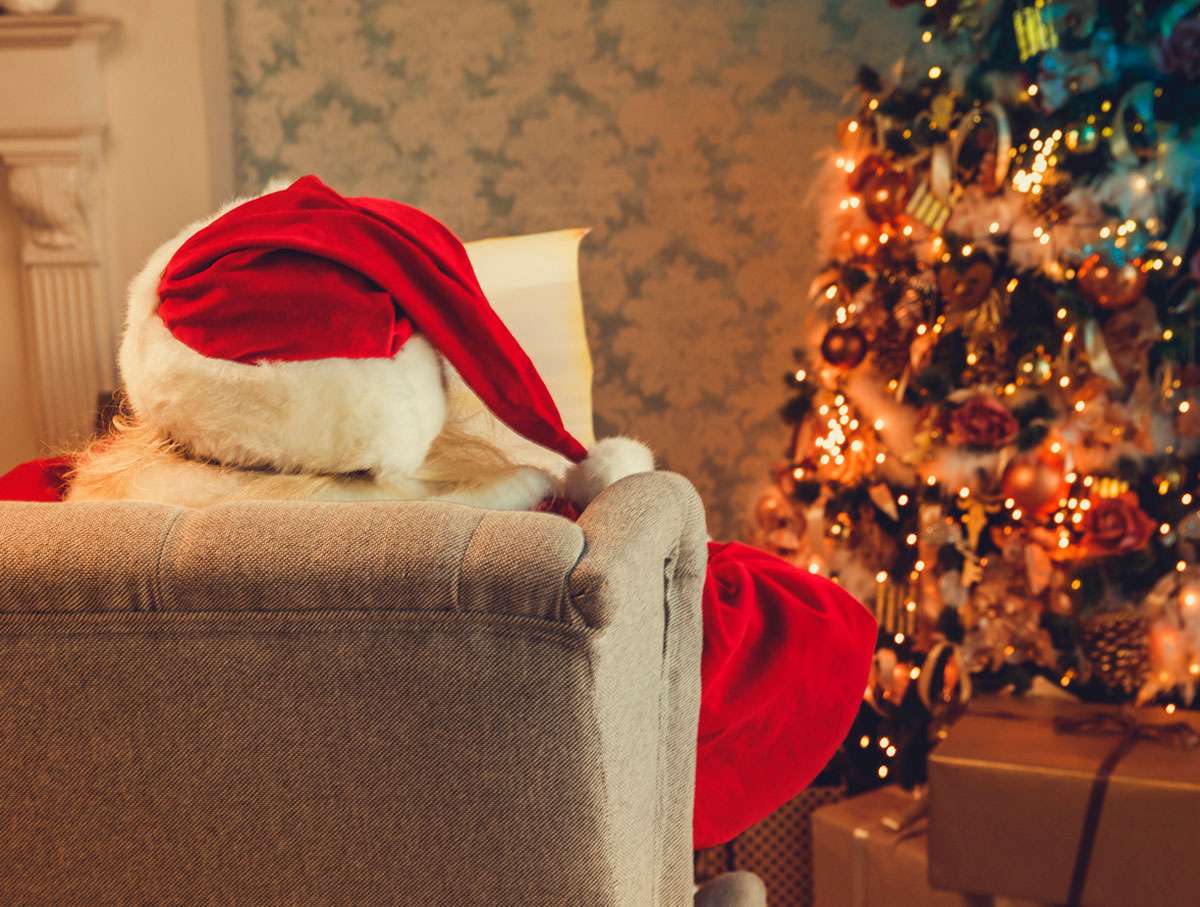 santa claus sitting at couch
