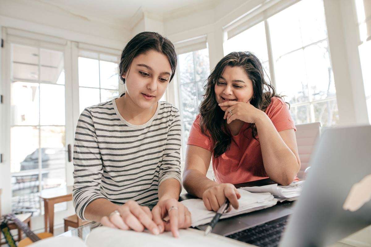 mom helping teen choose a college