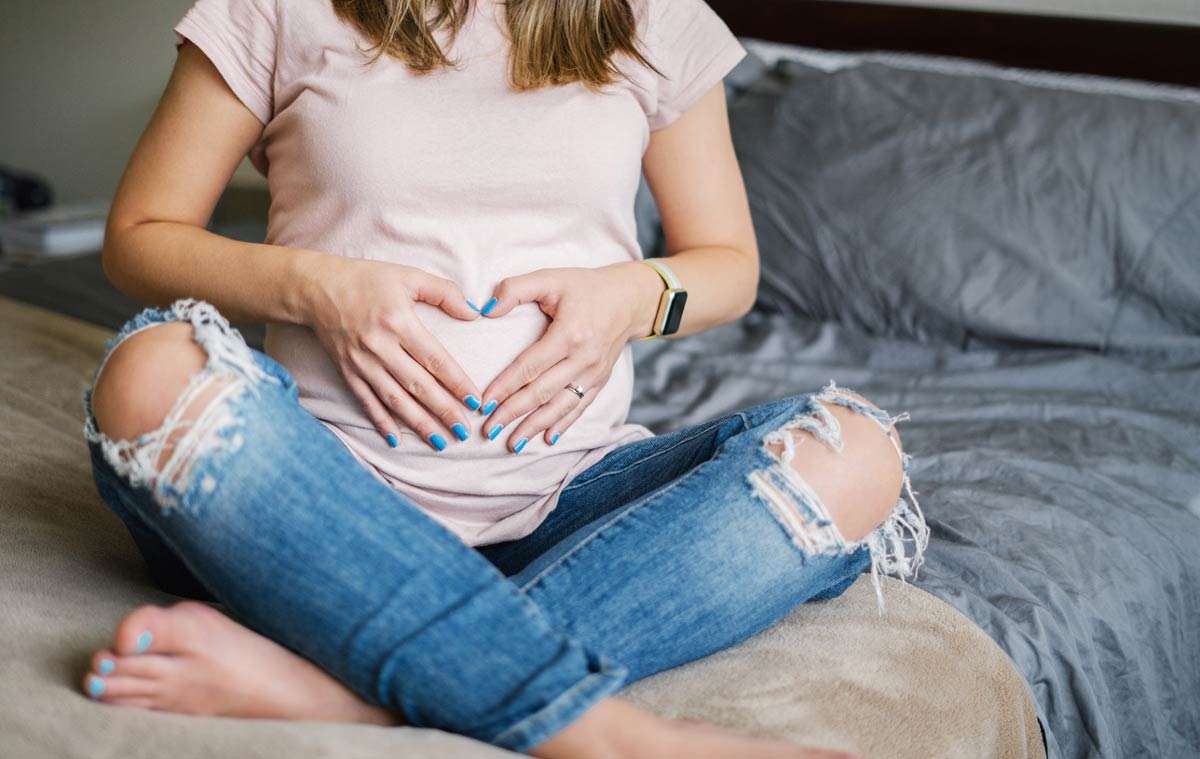 pregnant woman with manicure
