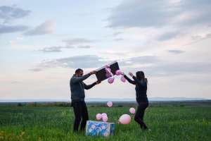 family having a gender reveal party