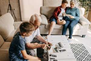 Grandparents sharing family history inspired gifts with their grandchildren