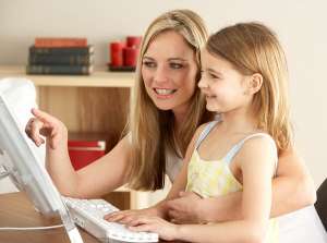 Tips for Learning Outside of School, Mom and girl search the internet together as learning activity