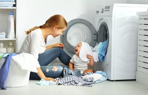 Mom and Baby Doing Laundry