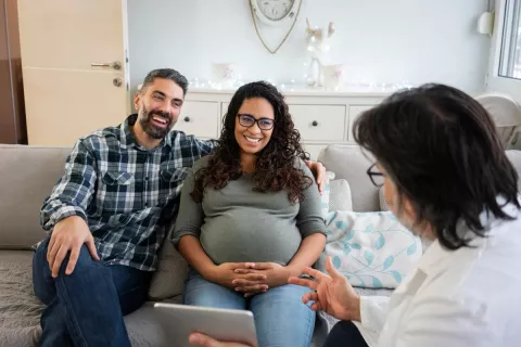 couple at prenatal genetics counseling session