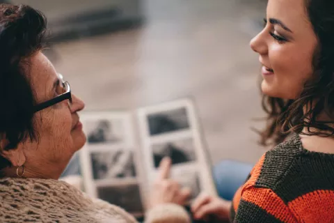 woman talking to grandma about family health history