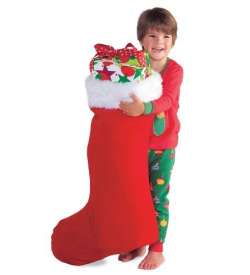 child with huge Christmas stocking