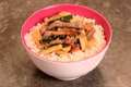 Stir-fry shredded beef on rice