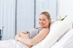 Happy Pregnant Women on Hospital Bed