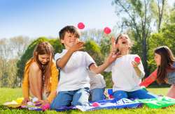 Children playing with colorful balls