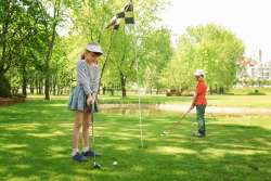Kids playing golf
