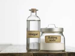 Use baking soda and vinegar to create a volcano