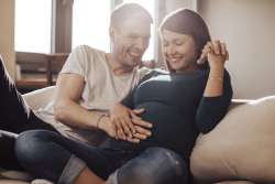 happy pregnant mom and dad-to-be 
