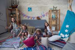 kids playing in an organized playroom