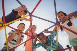 diverse group of kids on playground