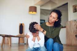 mom comforting kid with stress