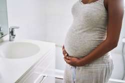 pregnant woman in bathroom