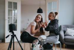 Two girls filming Youtube vlog