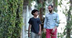 Father and son walking