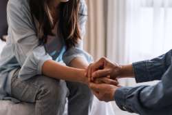 Couple holding hands