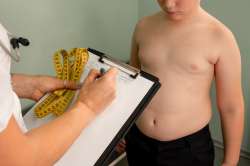 Child being weighed