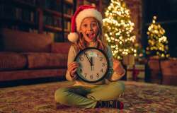 Child counting down to New Year's