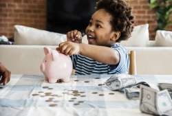 kid with piggy bank