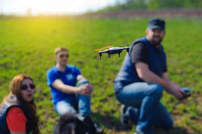 family flying drone