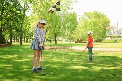 Kids playing golf