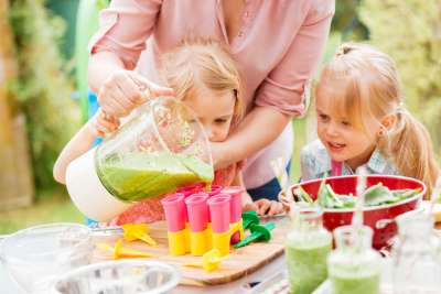 mom making superfood powder popsicles