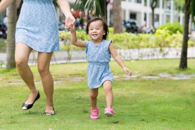 mother and toddler wearing mommy and me dresses