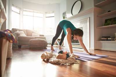 woman and baby experiencing the benefits of yoga