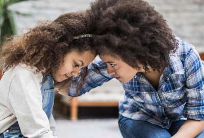 mom disciplining sensitive daughter 