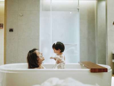 Mom and baby at bath time