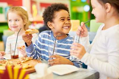 Kids at a Curious George birthday party