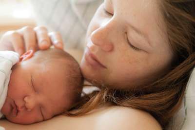 mom with freckles with baby